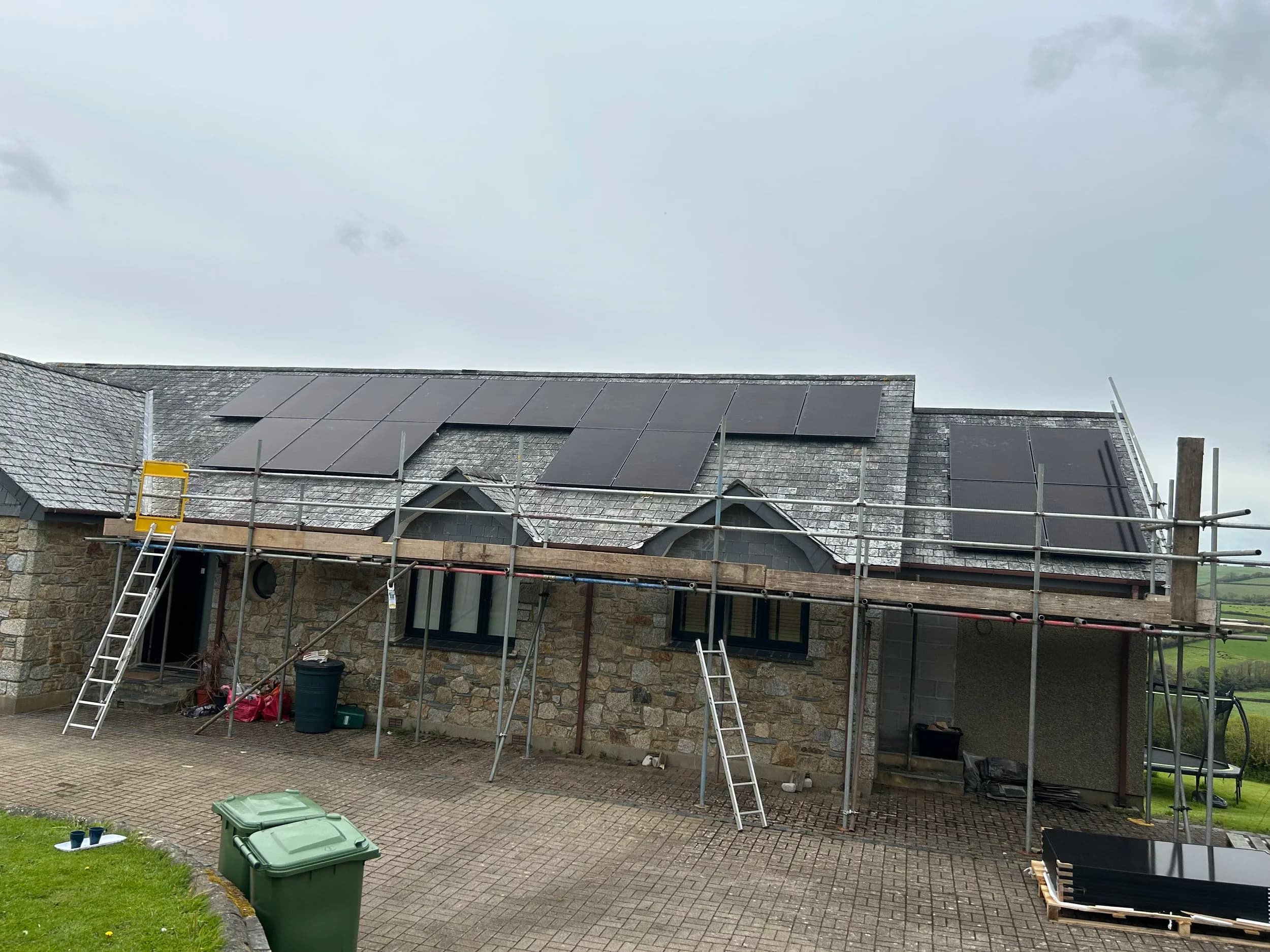The finished row of solar panels along the farmhouse roof at Dolcoath