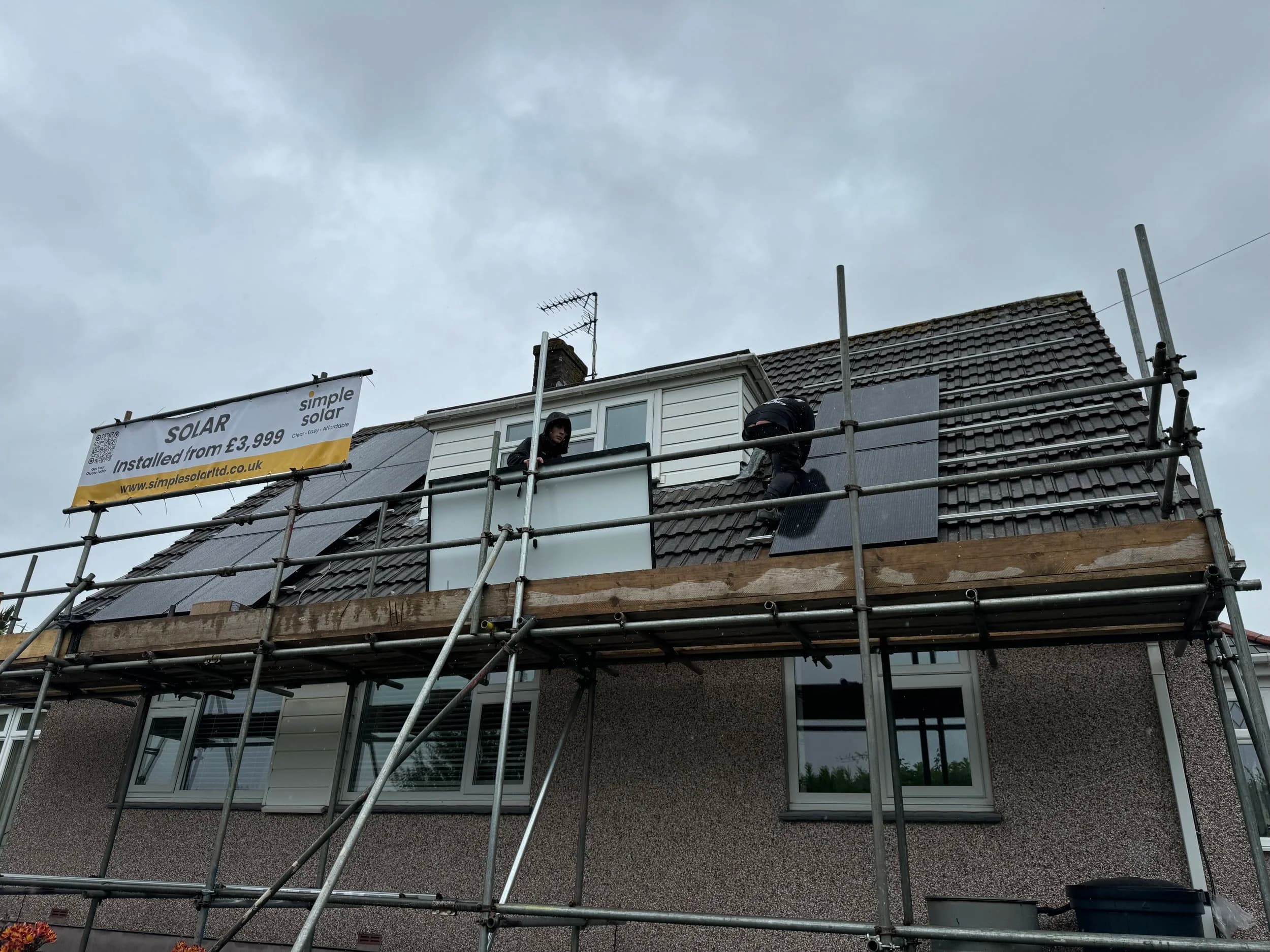 The front of the Springfield house with scaffolding and new solar panels