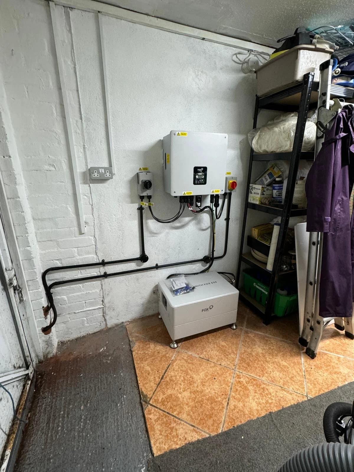 An inverter and battery installed in the utility room at Springfield
